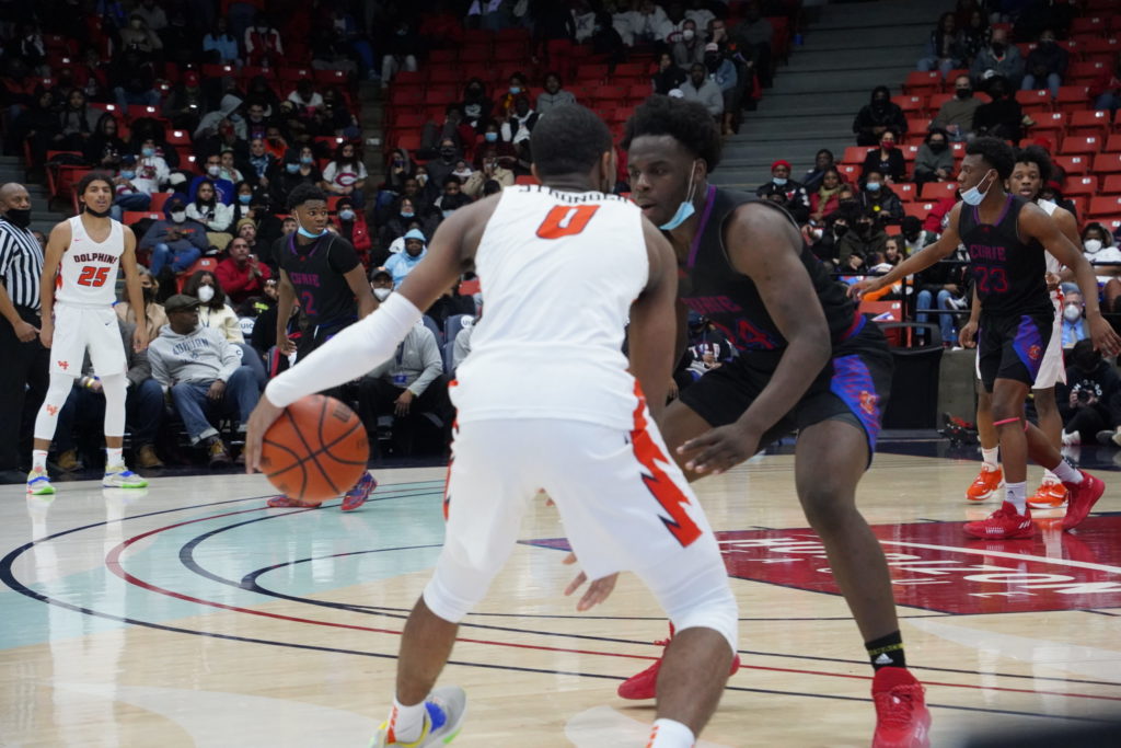 Whitney Young's AJ Casey makes a move against Curie