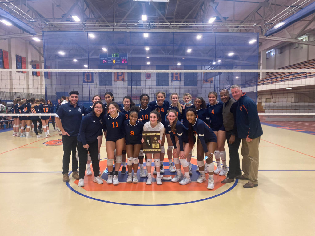 Whitney Young celebrates with their regional trophy following their win. Young, led by seasoned coach Justin Parra, has enjoyed much success with their new arrival. Photo courtesy of Chicago Public League