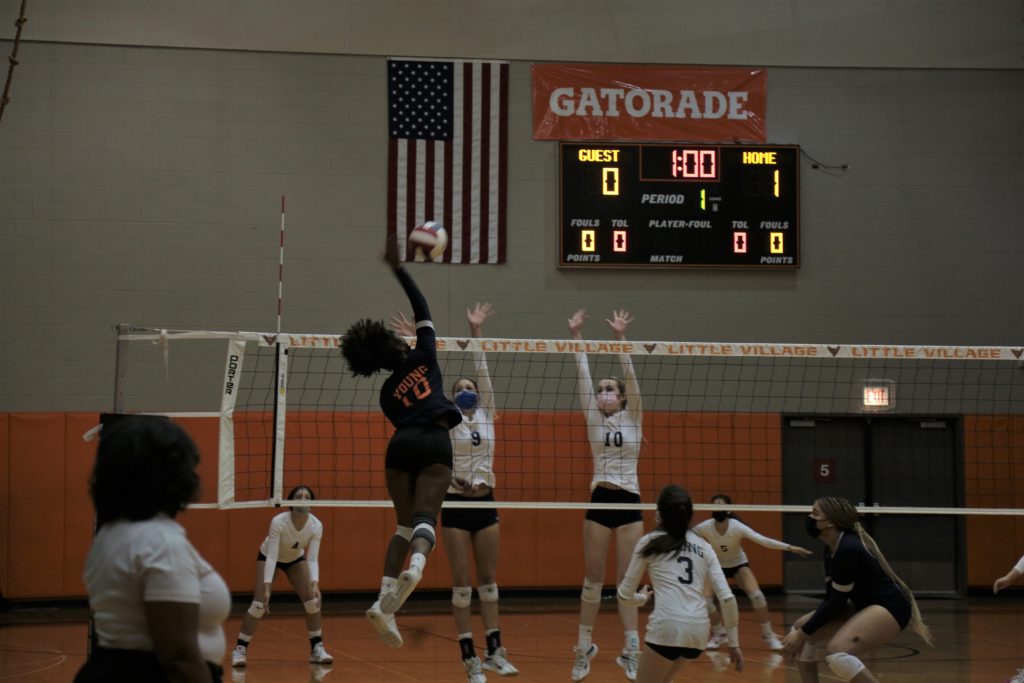 Walker lines up a spike. Photo courtesy of Chicago Public League.