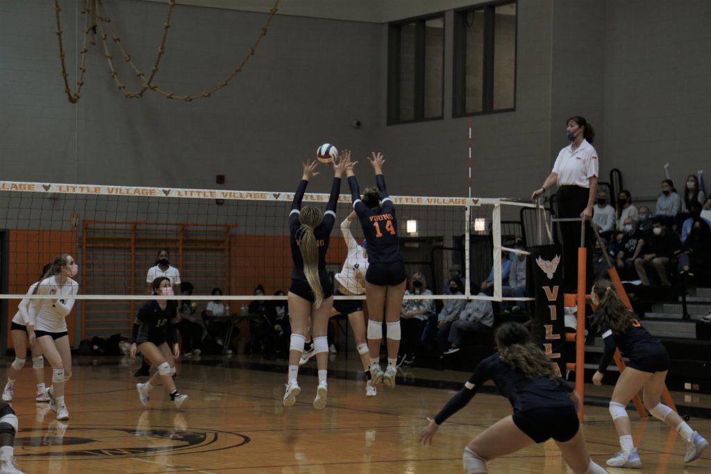 Thorpe jumps up for the block. Photo courtesy of Chicago Public League.