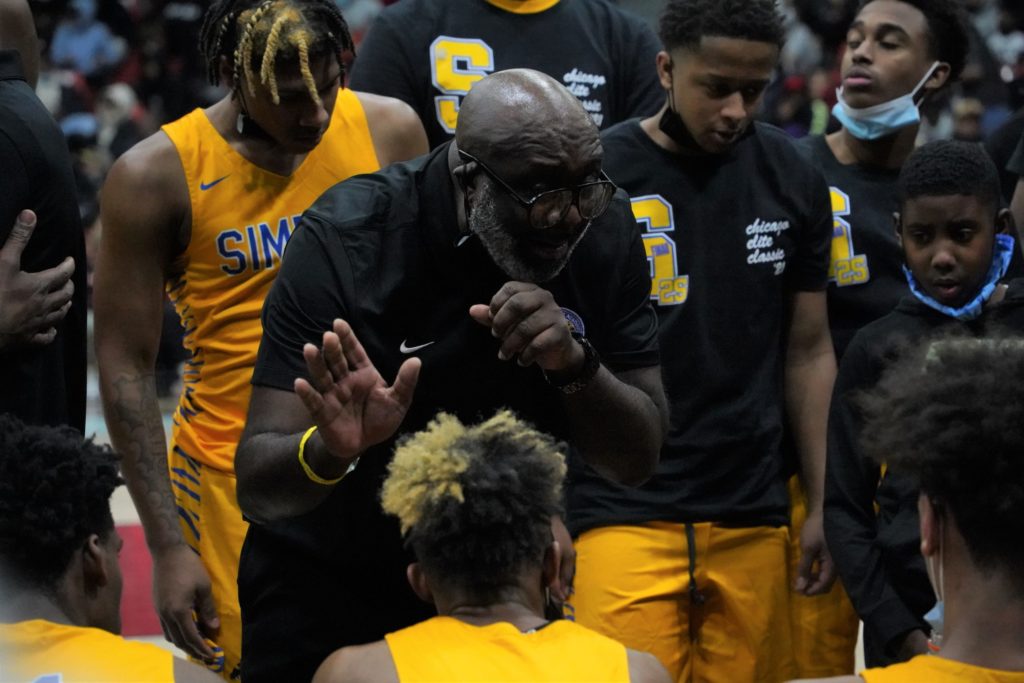 Simeon head coach Rob Smith takes action during a timeout.