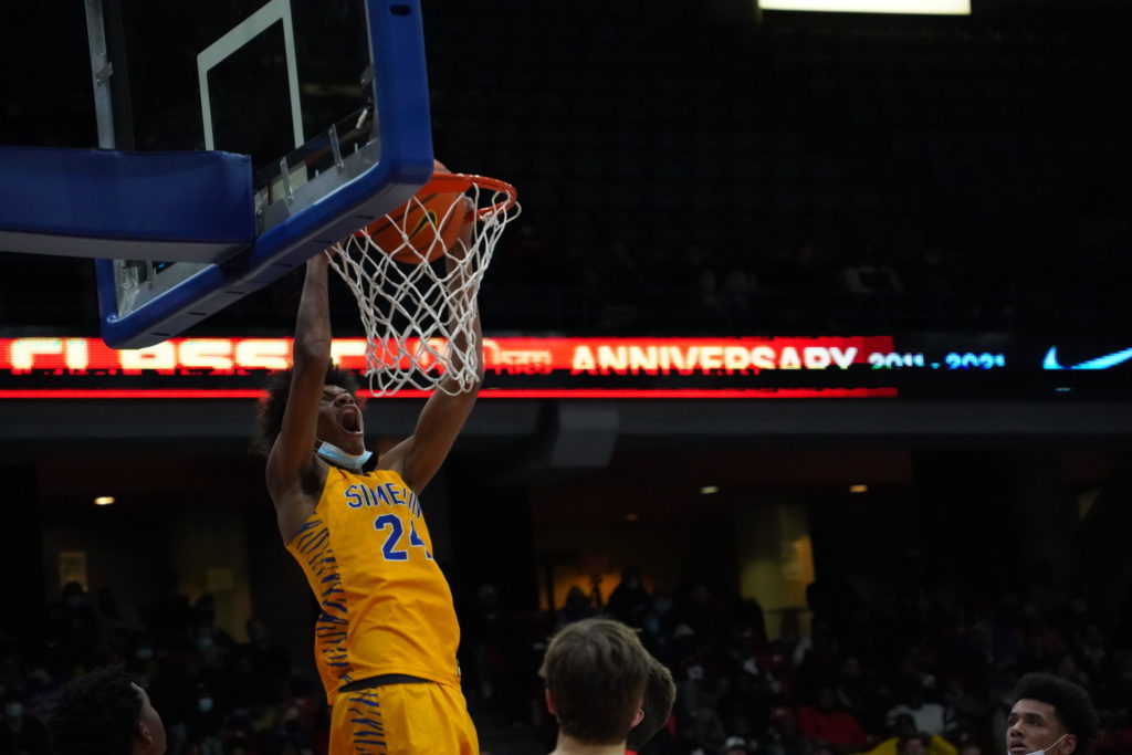 Simeon junior forward Miles Rubin throws it down