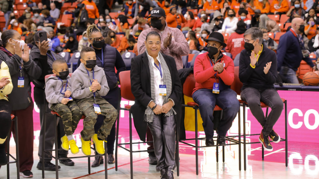 Dorothy Gaters enjoys a round of applause during the city championship game.