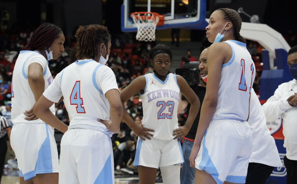 Kenwood talks strategy during a timeout. Photo by CPL