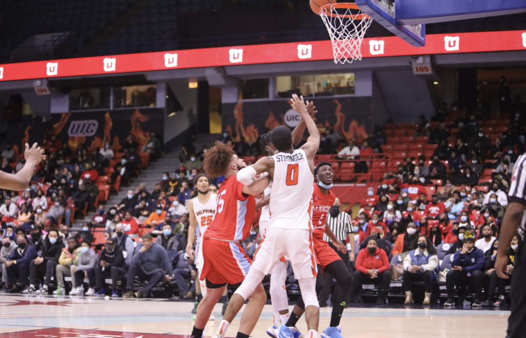 Casey defends the paint against Kenwood. Photo by CPL