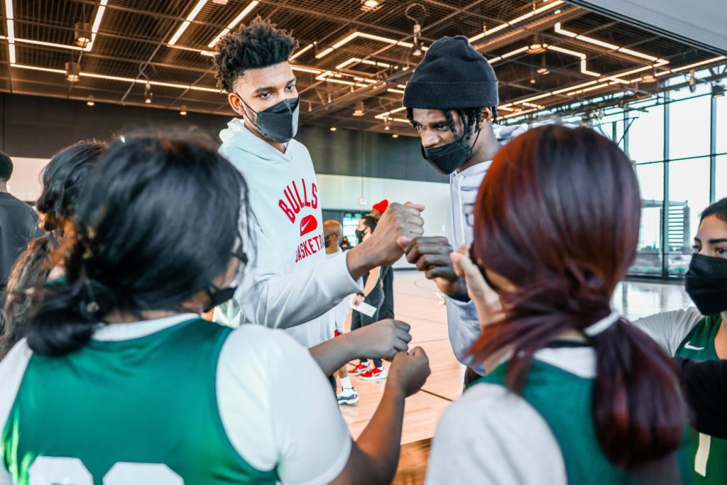 Bulls stars Lonzo Ball and DeMar DeRozan meet with Kelly players during an event hosted by the Bulls. The two teams met in December to celebrate Kelly's success.