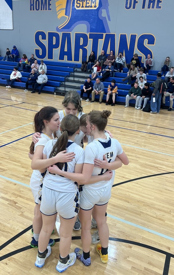 Spartan Girls Basketball huddle