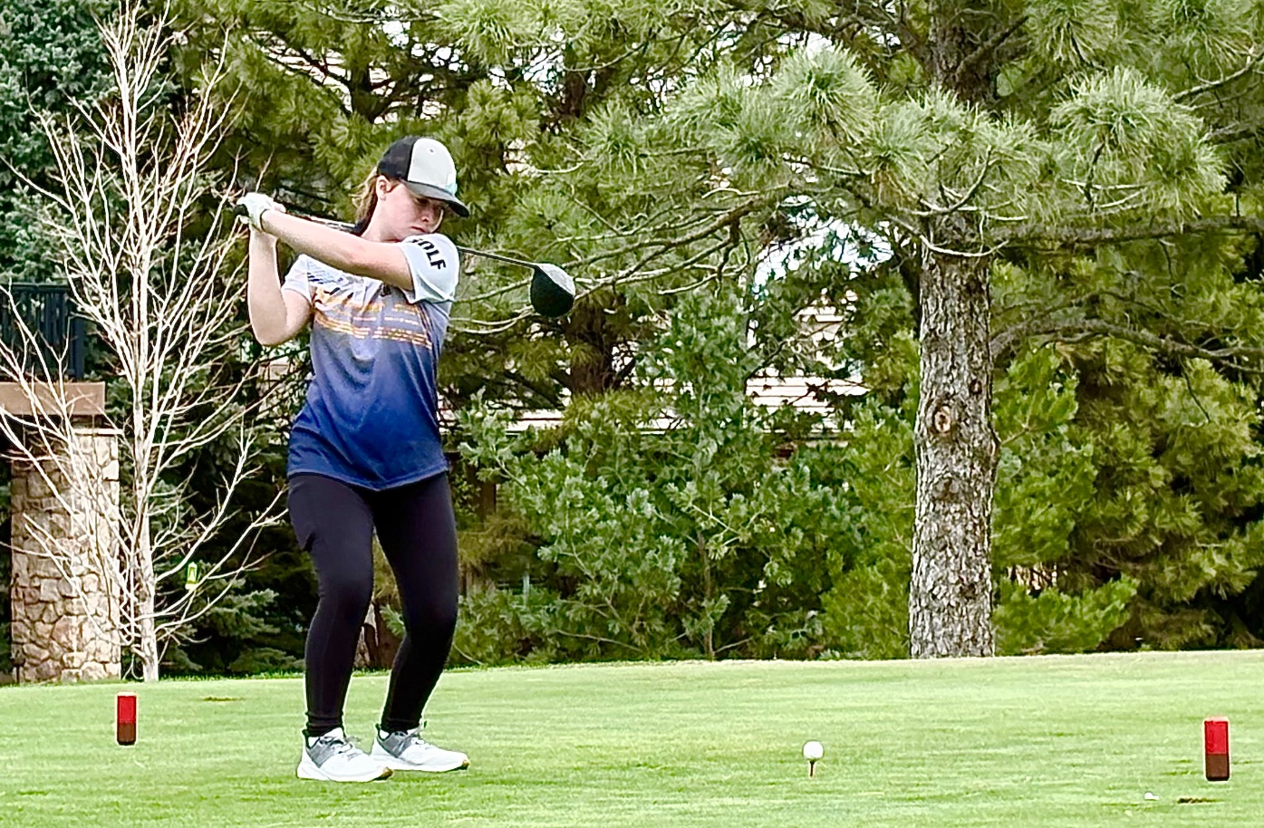 Leah tees off at Lone Tree