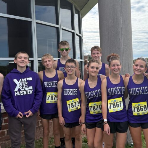 Cross Country team posing for a photo