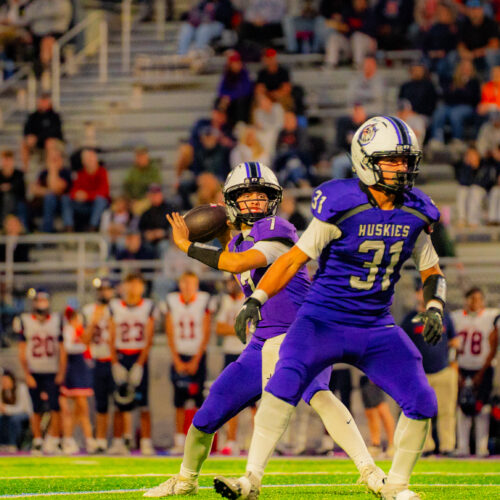Football player getting ready to throw the football