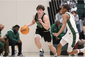 Nick Quartaro dribbling the ball upcourt.