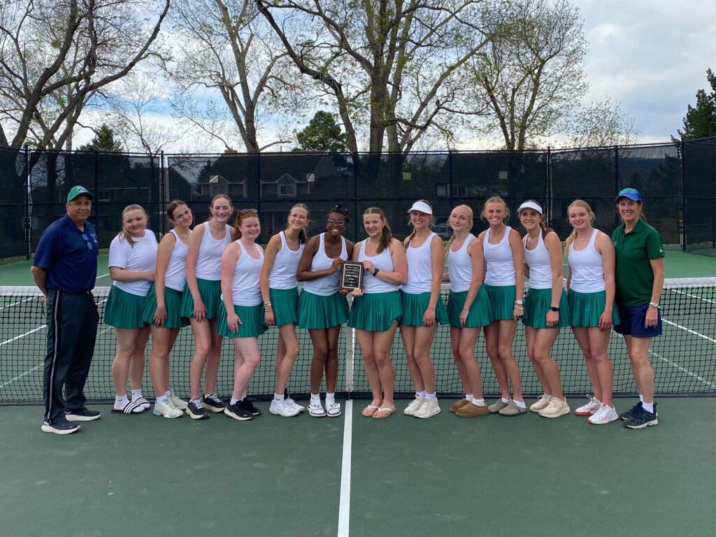  JV Tennis Players and Coaches Pose with first place plaque.