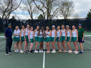 JV Tennis poses with first place plaque.
