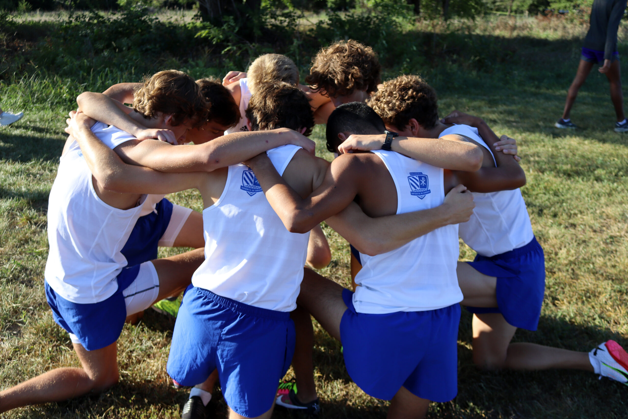 Varsity Huddle 1_Aquinas_XC_2024