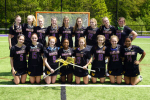 Sadie and the 2022-23 Wheeler Girls Lacrosse team.
