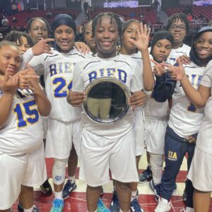 Audenried Junior, Aniyah Howard (Center) celebrates with teammates after their win