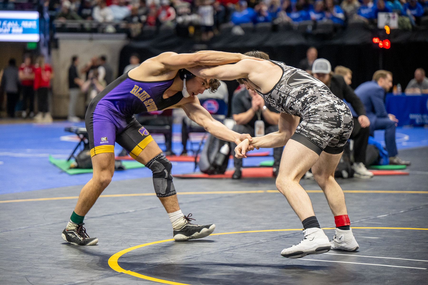 Blue Springs wrestler competing on the mat.