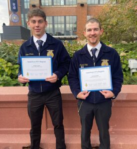 Two Students holding FFA