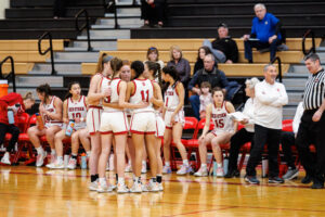 girls bball huddle 24