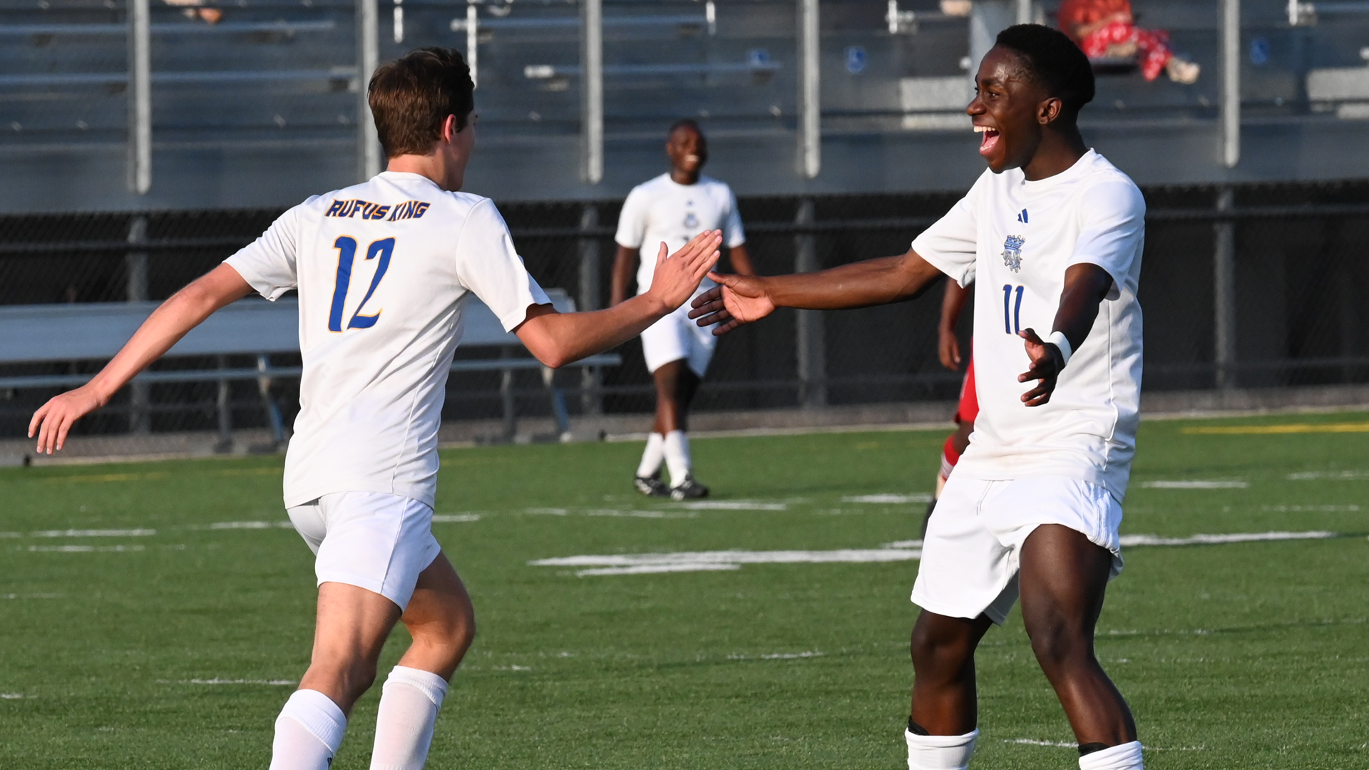 Rufus King boys soccer celebrates after a goal