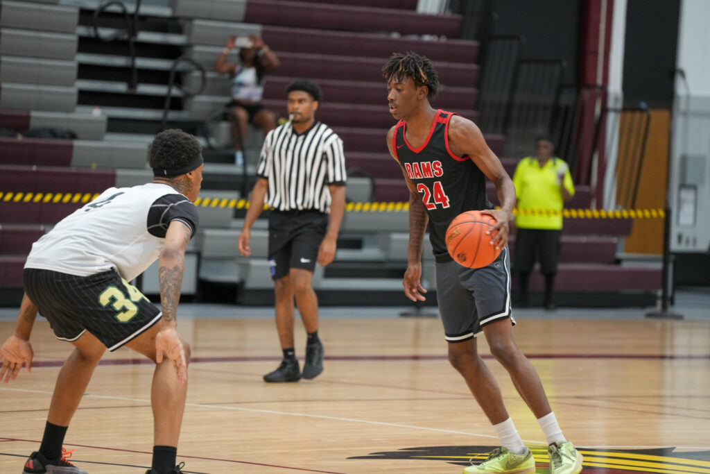 Student-athletes from two MCC teams playing in a summer league basketball game.