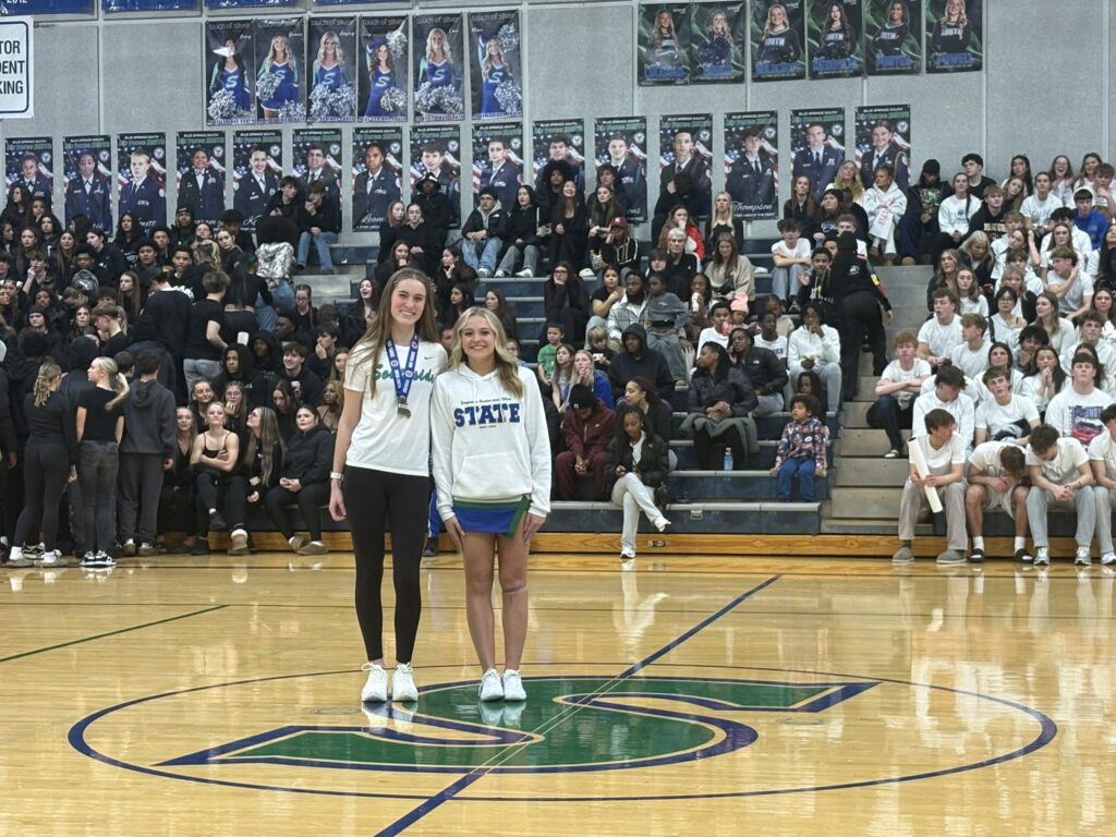 Girls swim and dive athletes.