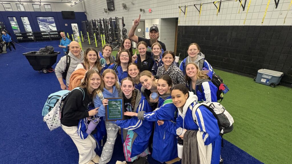 Swim team and coaches. 