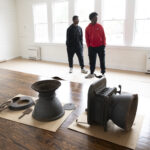 Quince Orchard varsity soccer team participates in an event at the Pleasant View Historical Site where they learned some of the history of the church and one-room school house as well as did clean-up of the grounds and helped reset furniture in the historic one-room school house	.