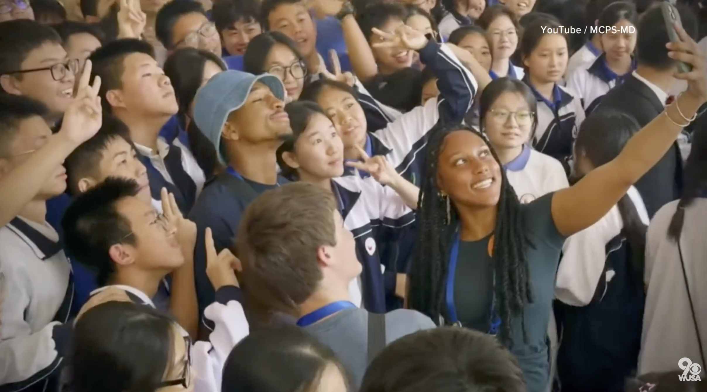 Students take a picture.