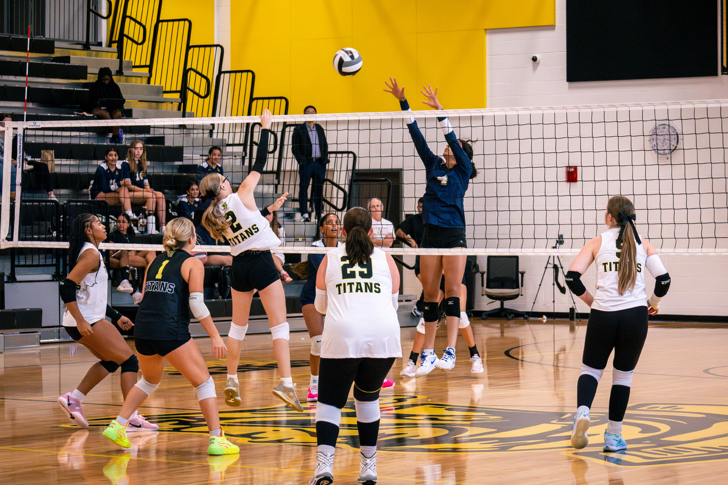 A St. Bernard-Elmwood Place volleyball player spikes a ball in a game.