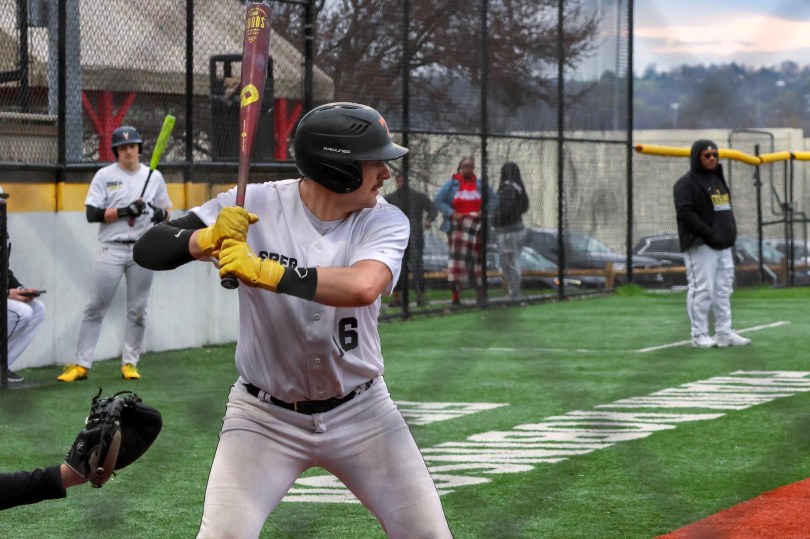 An SBEP baseball player stands in the box, waiting for the pitch.