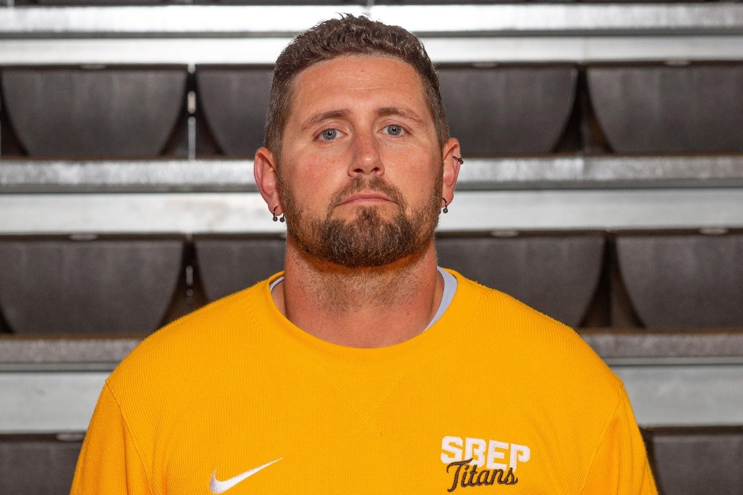 St. Bernard-Elmwood Place football head coach Kyle Hogan stands for a photo.