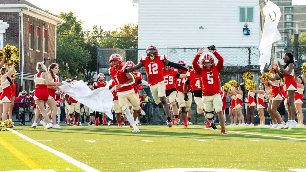 Football team entering field