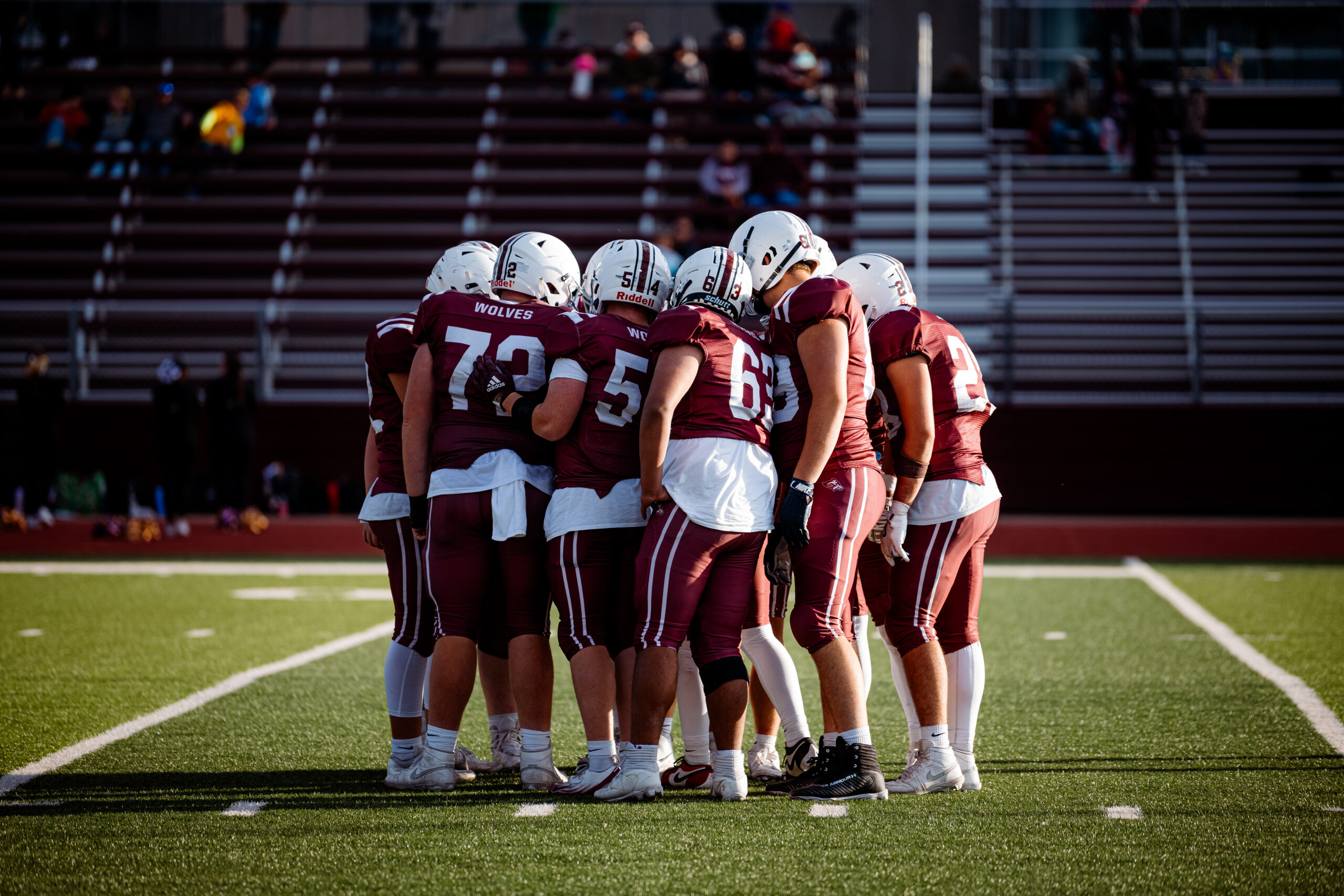 Home Football Game - Team Huddle