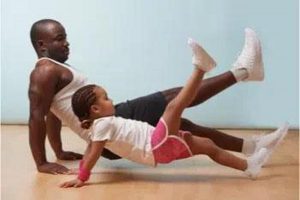 Man and little girl stretching