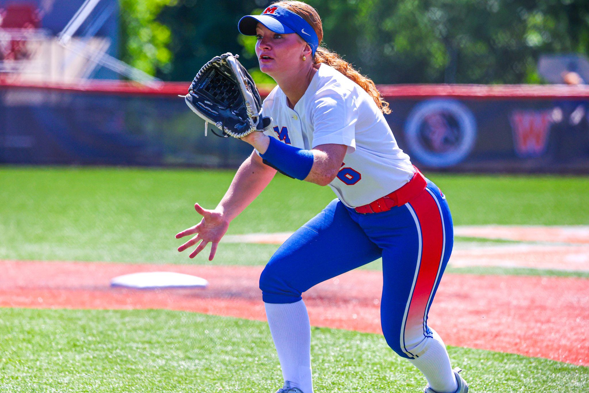 Softball player in a stance.