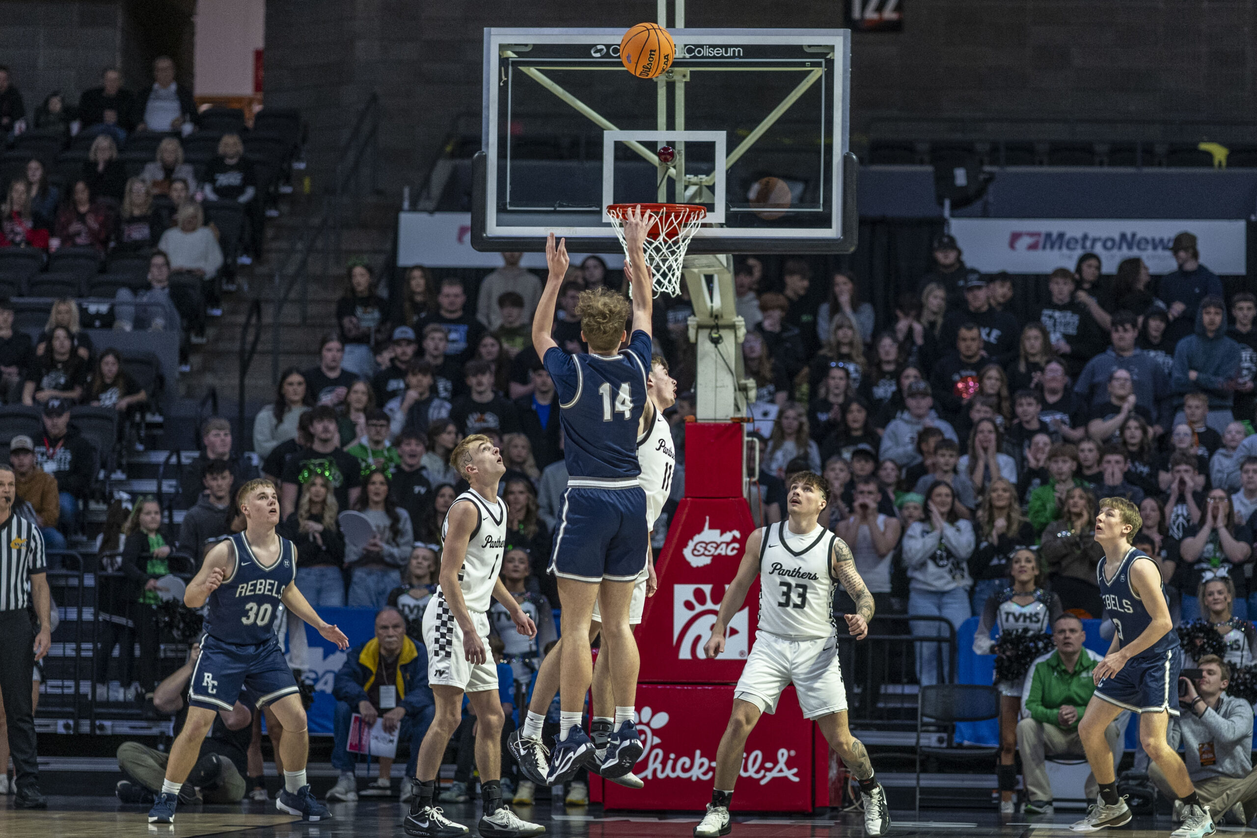 A basketball player shooting the ball.