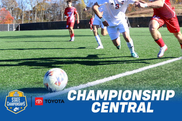 Soccer players in red and white uniforms chase a ball along the sideline of a turf field on a sunny fall day. Text reads “Championship Central” beside the 2027 WVSSAC Soccer State Championships logo and the Toyota logo.