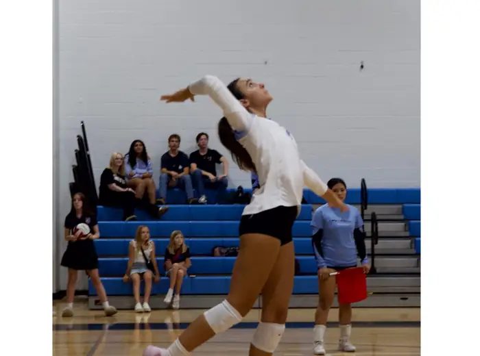 Veritas volleyball athlete in competition
