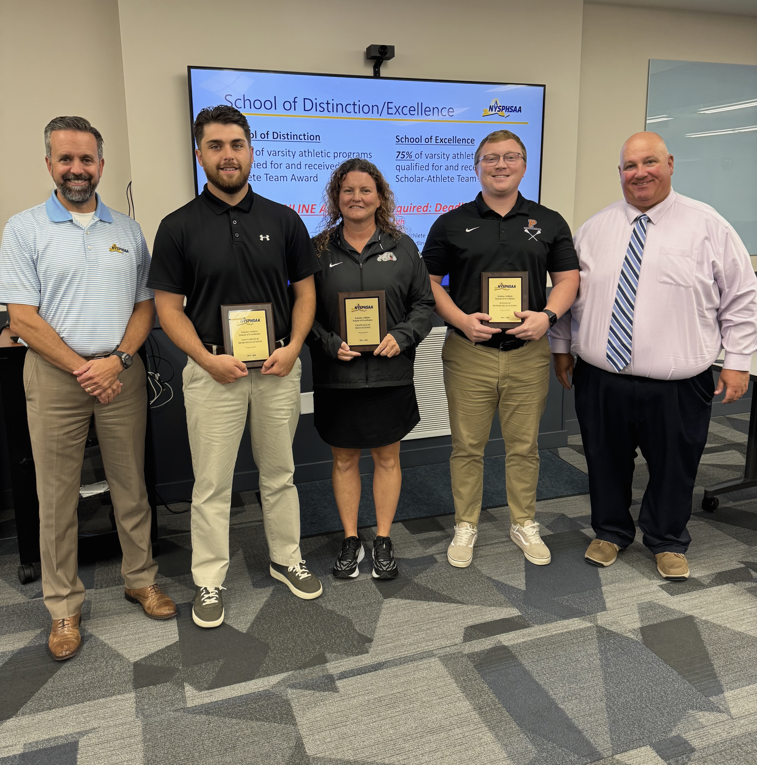 Dr. Robert Zayas, executive director of NYSPHSAA; Aaron McEathron, director of athletics at Gouverneur; Michelle Reynolds, director of athletics at Chateaugay; Zach Marcellus, director of athletics at Potsdam; and Mark Wilson, executive director of Section X.