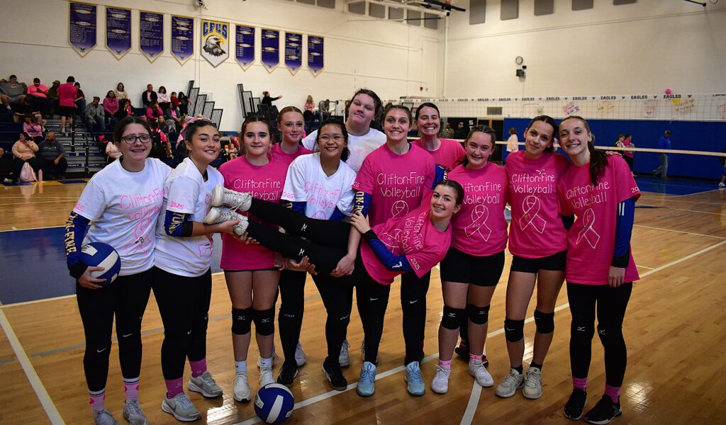 Clifton-Fine volleyball group photo at pink game