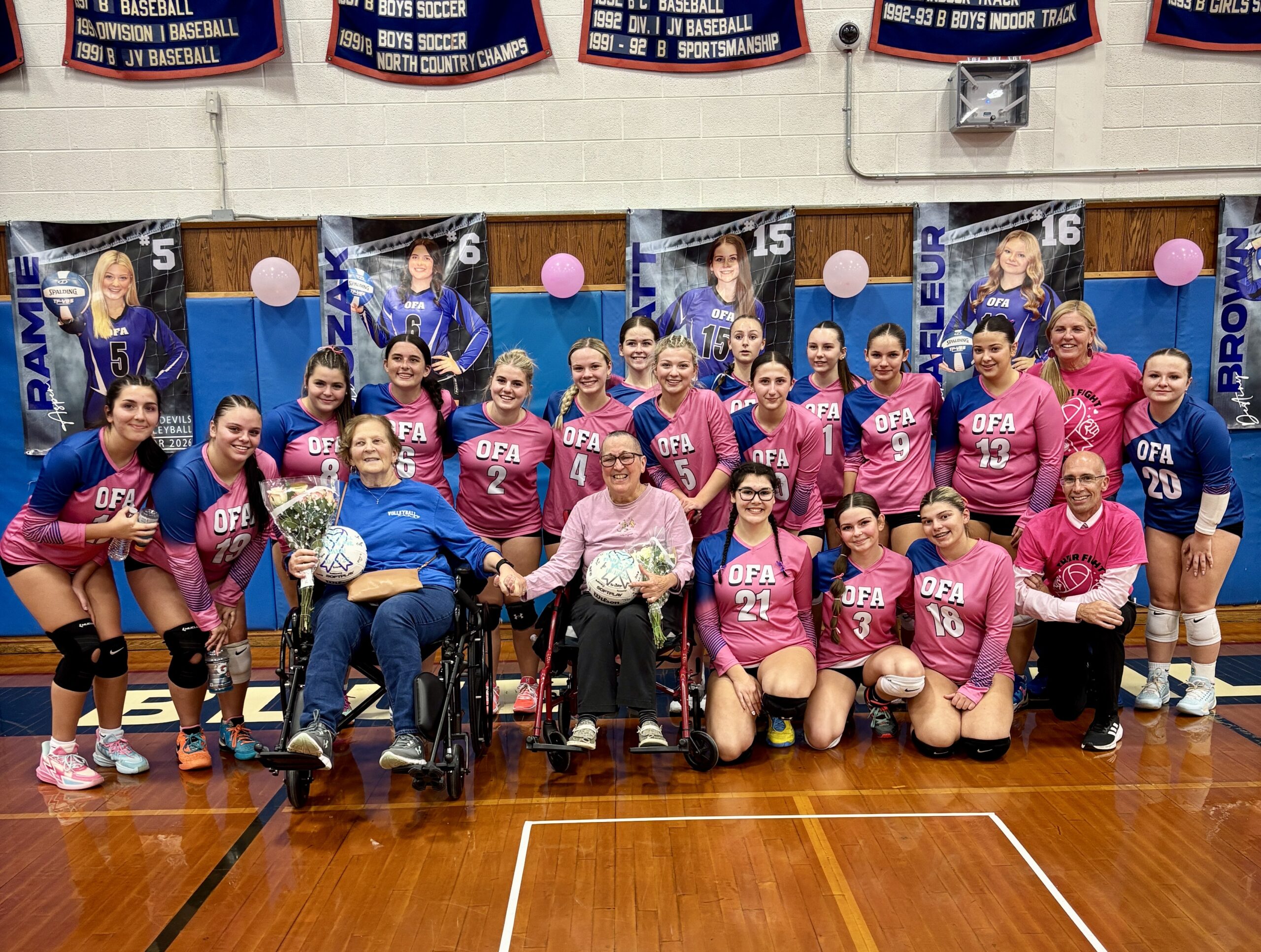 Ogdensburg Free Academy varsity volleyball group photo at pink game