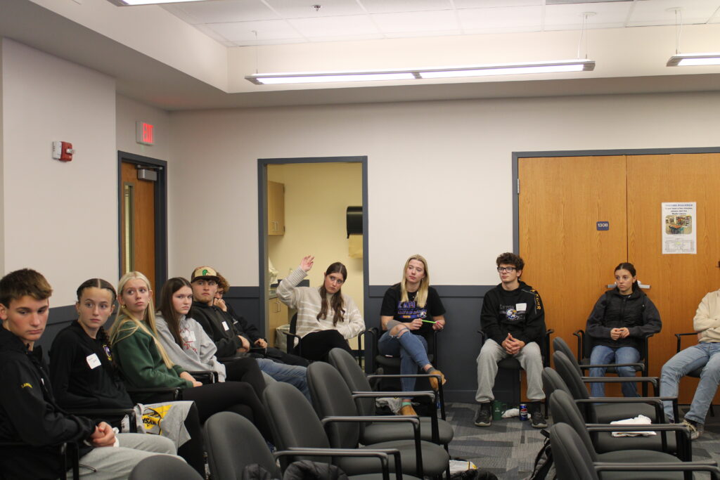 High school students sitting in a circle