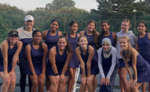 McDowell girls tennis team poses for photo at Frontier Park after team victory