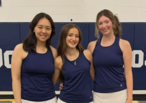 mcdowell seniors pose together at senior day in gym.
