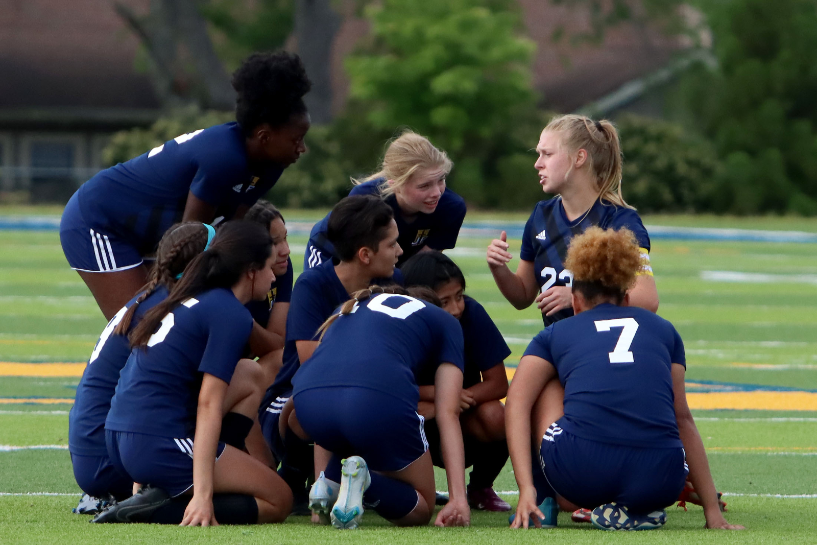 Soccer Girls Player in a Team Huddle