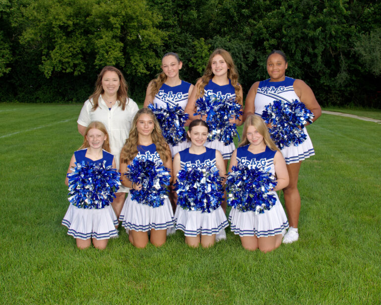 Junior Varsity Cheer squad dressed in cheer outfits