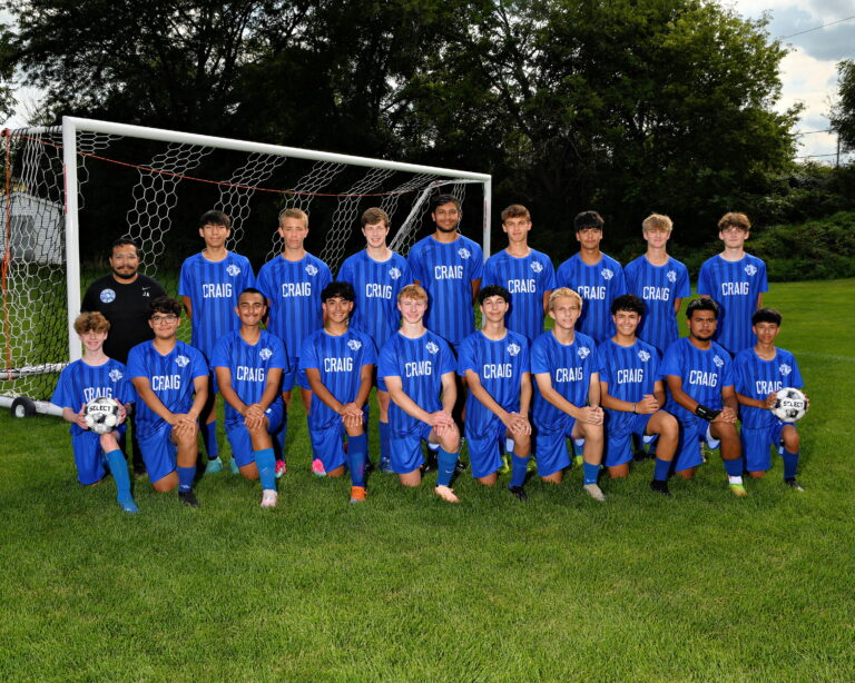 Boys jv soccer team, boys dressed in blue uniforms