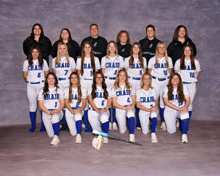 girls varsity softball in white uniform