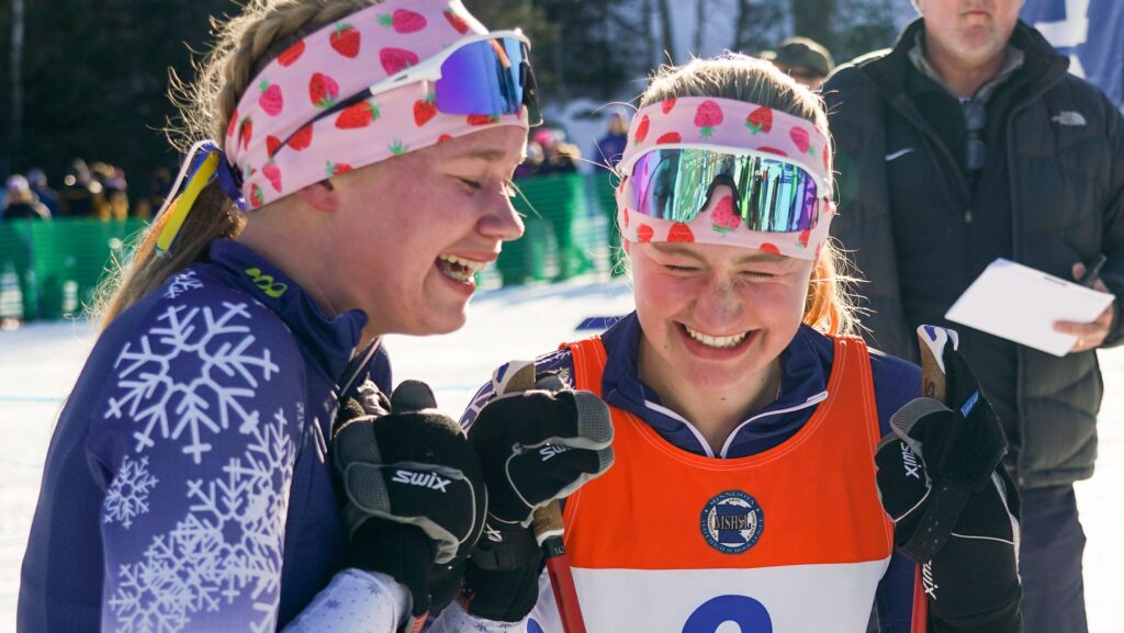 St. Paul Academy's Maren Overgaard, left, celebrates with her teammate and sister Alyda Overgaard after they won the Girls Team Sprint Final race during the Nordic Ski Racing State Meet at Giants Ridge in Biwabik on Wednesday, February. 11, 2026. St. Paul Academy placed first.(Craig Lassig / Special to the Pioneer Press)